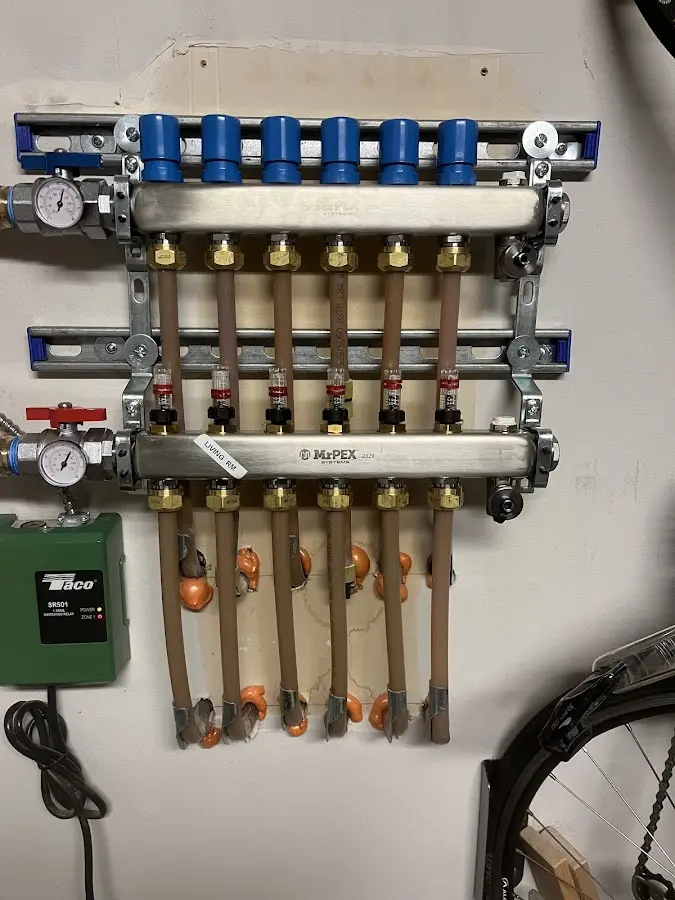 Plumber performing Gas Leak Detection at a residential property in Lake Luzerne